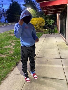 Light Blue Graphic Hoodie with design on hood